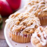 These homemade Strawberry Crumb Cake Muffins are made with fresh strawberries and topped with a crumb cake streusel and vanilla glaze! These easy strawberry muffins make a great breakfast, easy brunch recipe, or on-the-go snack! Plus, this Strawberry Crumb Cake Muffin recipe is ridiculously simple! Easy peasy.